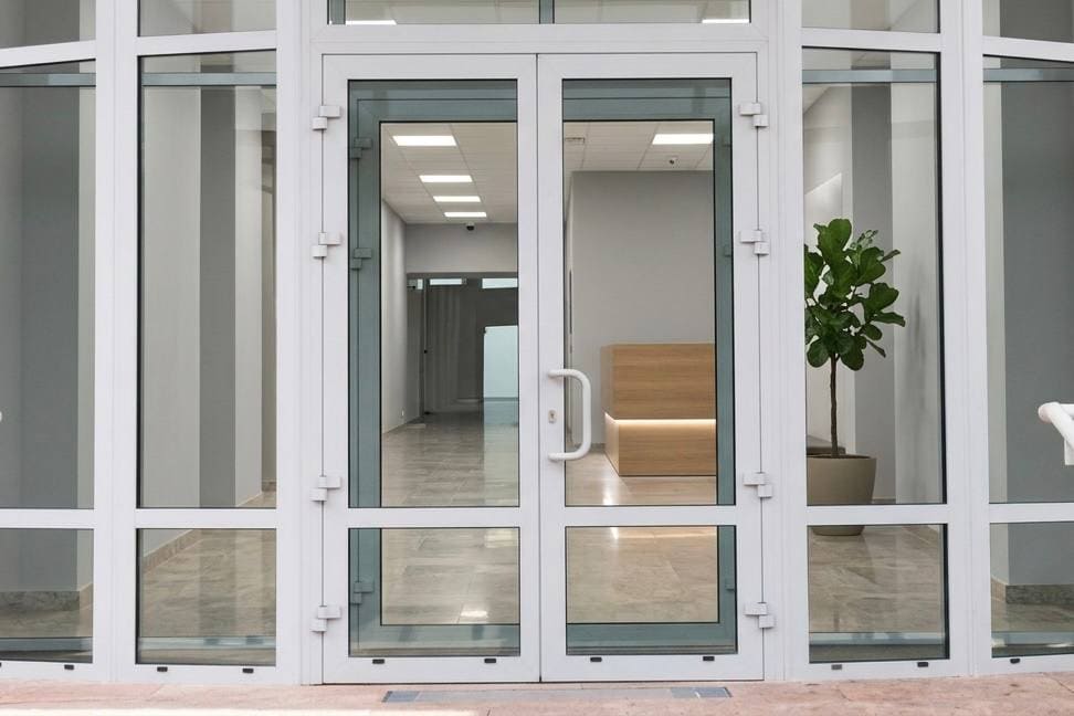 Storefront glass door repair near King West in Toronto