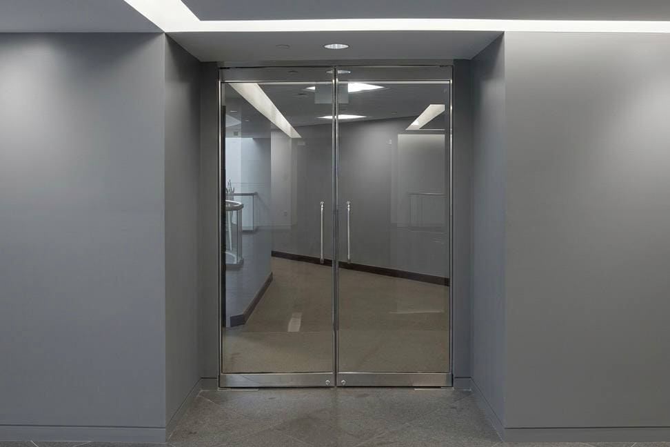 Storefront glass door repair project in a Mississauga retail plaza